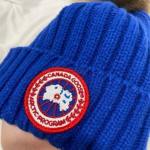 Blue Canada Goose winter toque with fur pompom